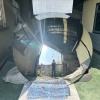 Large convex mirror stainless steel disc during final surface inspection