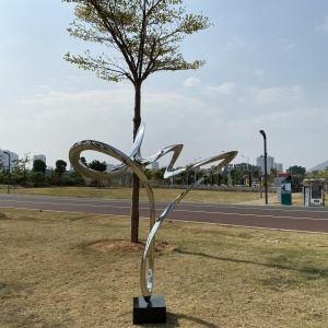 Second finished view of the same branching ribbon sculpture