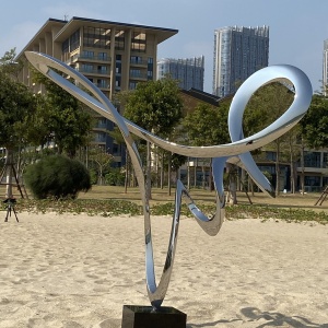 Installed project view of the same stainless steel loop sculpture