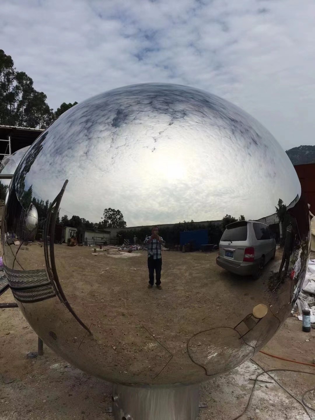 Mirror stainless steel sphere surface detail
