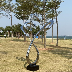 Second view of the same mirror stainless steel spiral sculpture