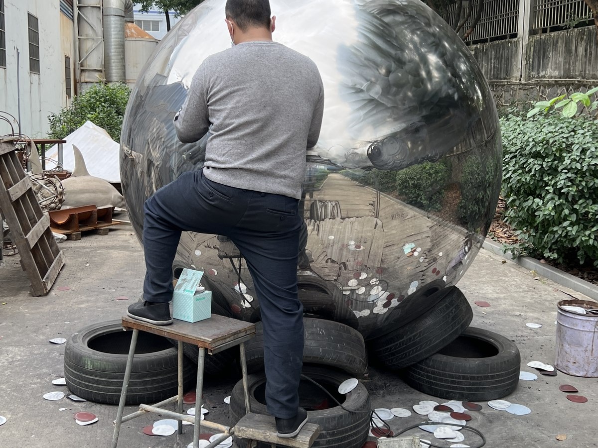 Mirror stainless steel sphere polishing