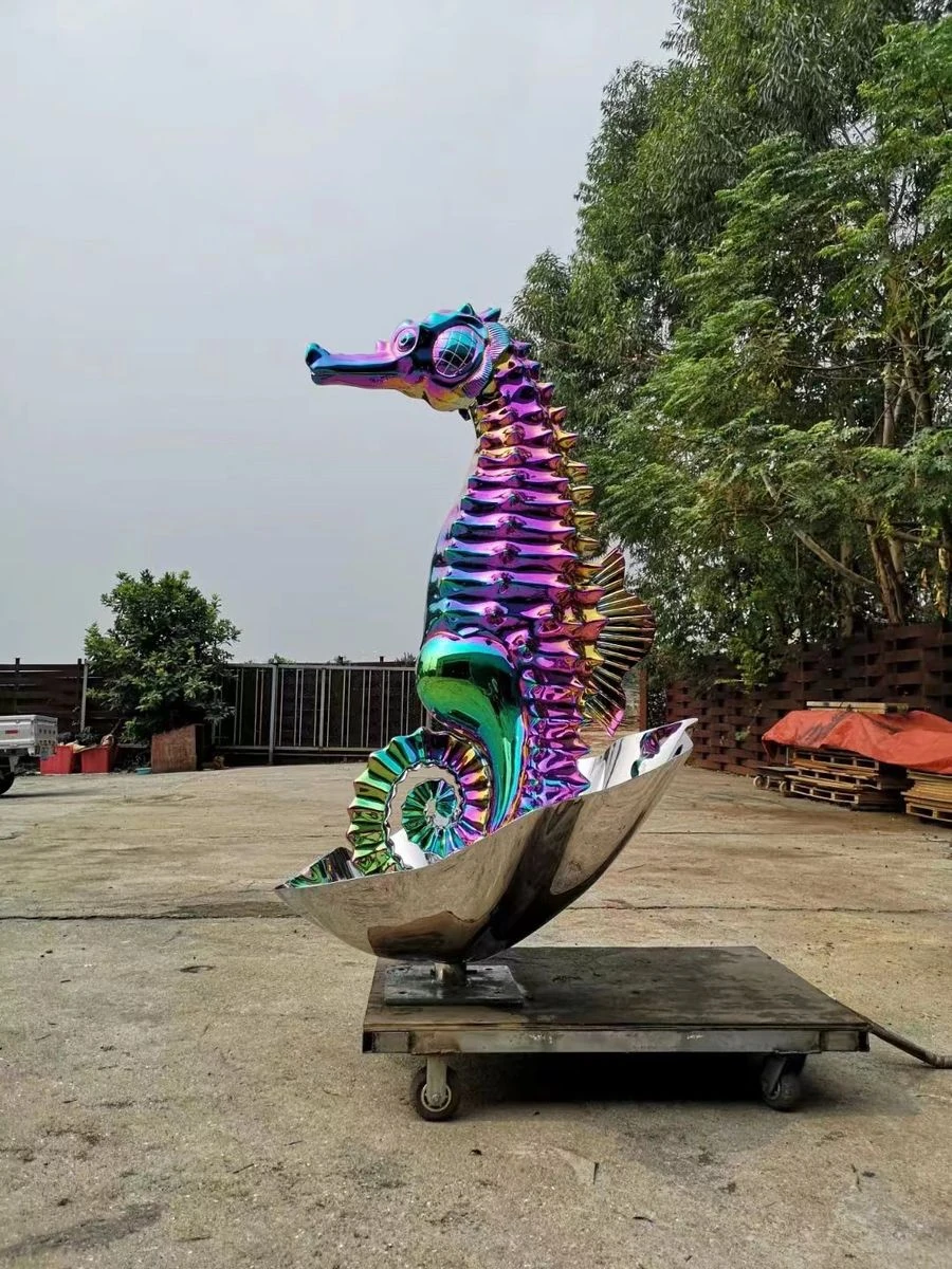 Stainless steel seahorse sculpture with a rainbow titanium (PVD) coating on a mirror-polished shell